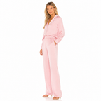 Women's pink lapel shirt and trouser set side view